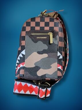 Sprayground Sharks In Paris Exterior Gold Zip Pocket Mini Backpack Sling